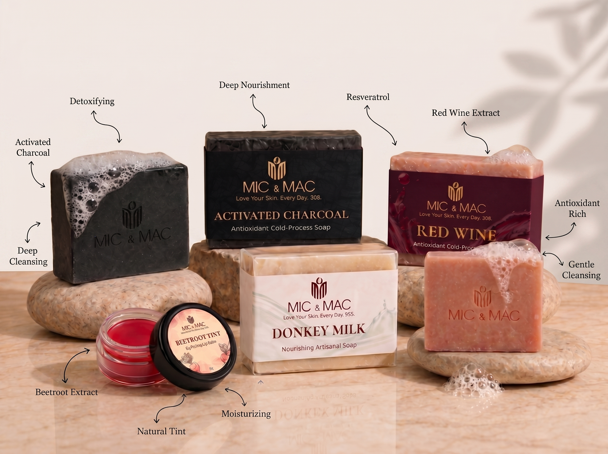 Collection of MIC & MAC soap bars with labels on a wooden surface